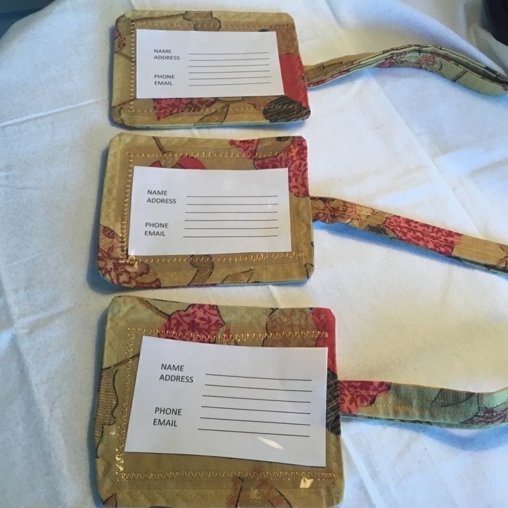 NWOT. Handmade set of 3 Luggage/Backpack Tags